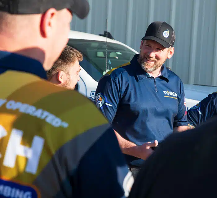 Torch owner Trey with team